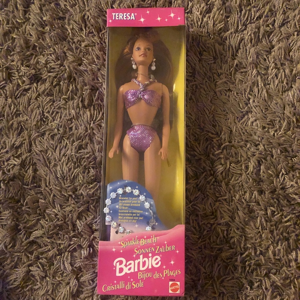 1995 Teresa Barbie Doll in Sparkling Purple Bikini with Bracelet to wear